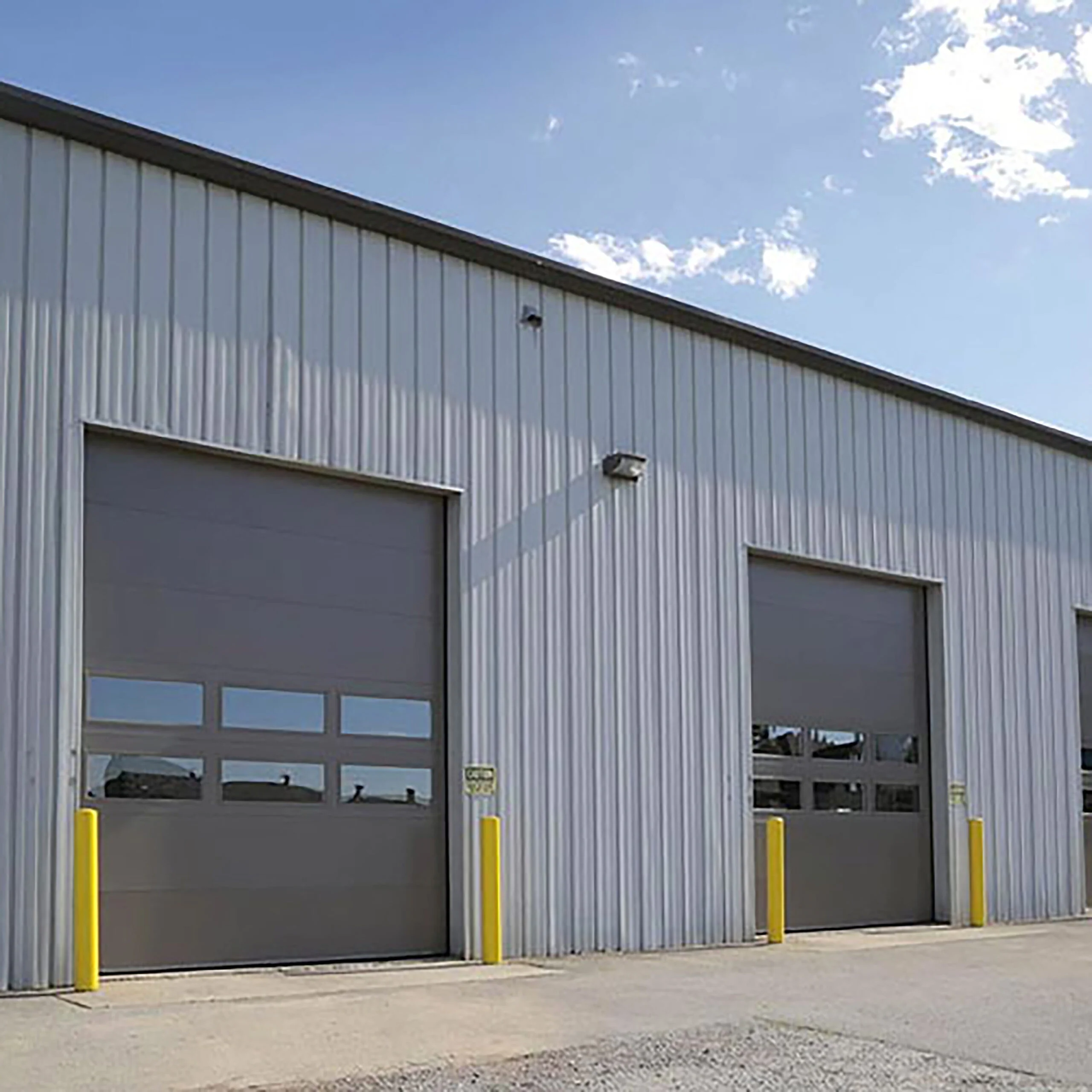 Close-up view of durable commercial garage doors showcasing solid construction and smooth performance.