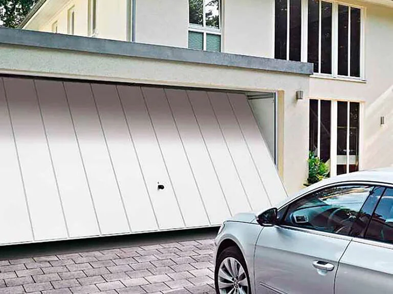 White paneled garage doors on a contemporary two-story home.